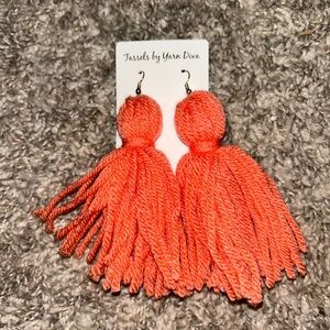 Women’s orange yarn earrings